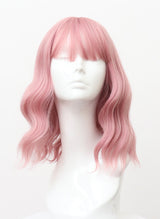 A mannequin head displaying a pink wig with natural waves and fringe.