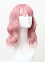 A mannequin head displaying a pink wig with natural waves and fringe.
