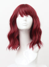 Plum colored wig with natural wave and fringe on a mannequin head.