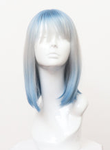 A synthetic long bob wig in blue ombre with fringe, displayed on a mannequin head.