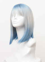A synthetic long bob wig in blue ombre with fringe, displayed on a mannequin head.