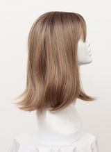 A synthetic dirty blonde shoulder-length wig with flicked tips and fringe displayed on a mannequin head.