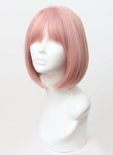 A synthetic pale pink bob wig with fringe displayed on a mannequin head.