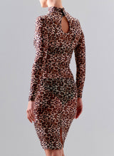 Back view of a model wearing a semi-sheer leopard print mesh dress with high collar and long sleeves. The dress finishes on the knee.