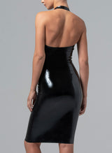 Back shot of a person wearing a black latex halter dress with a halter neck and low back.
