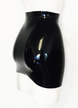 Back view of a black latex mini skirt on a white mannequin.