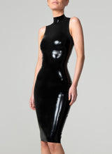 A person wearing a sleeveless black latex dress with a high collar and a long back zip.