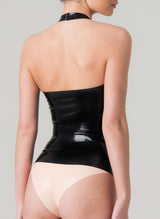 Back view of a model wearing a black latex halter neck top with sweetheart neckline.
