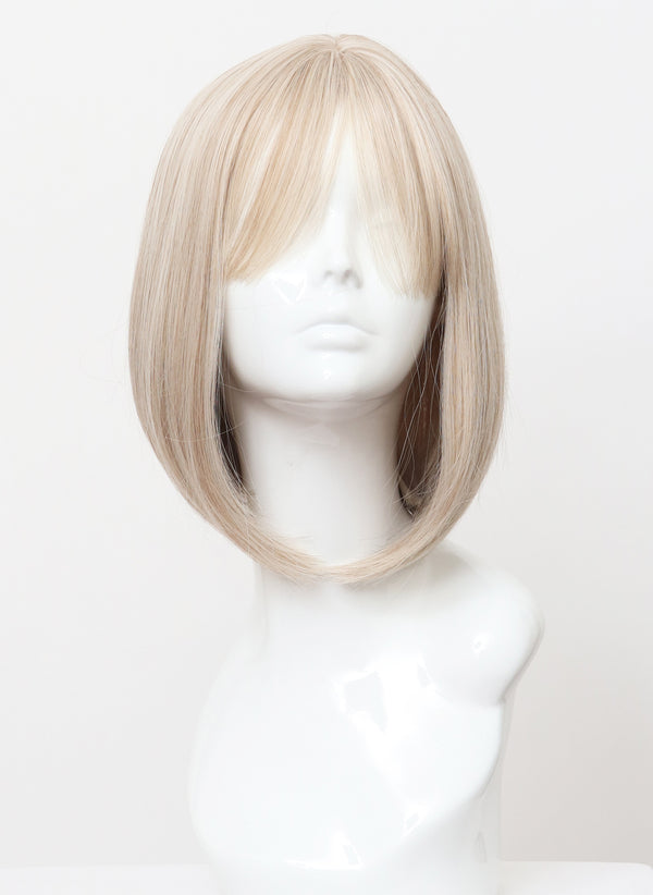 A blonde bob wig with fringe on a mannequin head.