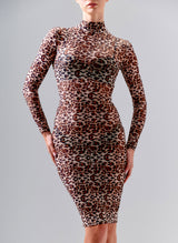 A model wears a semi-sheer leopard print mesh dress with high collar and long sleeves. The dress finishes on the knee.